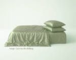 Close-up of Lunaya bamboo fabric showing smooth texture and natural sheen, sage green Bamboo Bedding Bundle, Lunaya, silky smooth texture, cooling, cozy, comfort, perfect for uae homes